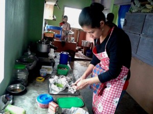 Ms Esther demonstrating the carrot and beetroot salad