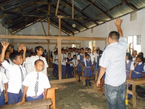 a session on the importance of Children participating in a session on indigenous food, seed knowledge and waste management with Michael Shadap.