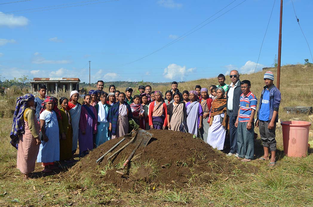 Some of the farmers with NESFAS staff gathering together for a group photo