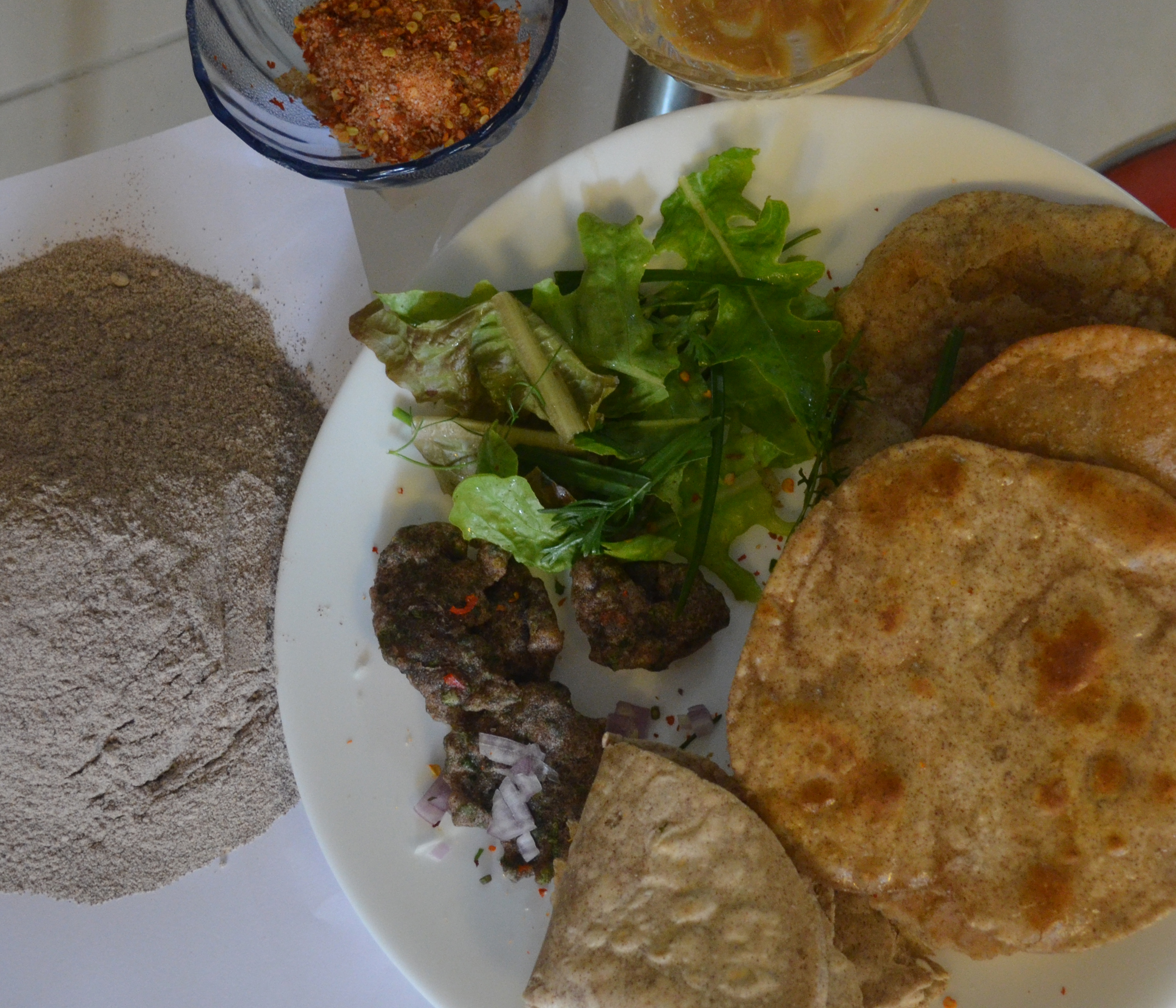 To make pooris, fry the chapatis in cooking oil for a while and its ready to be serve.