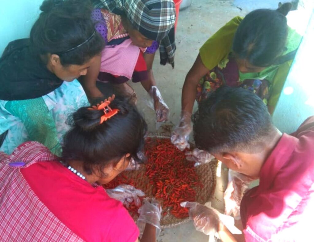 trainees partaking in the food processing training